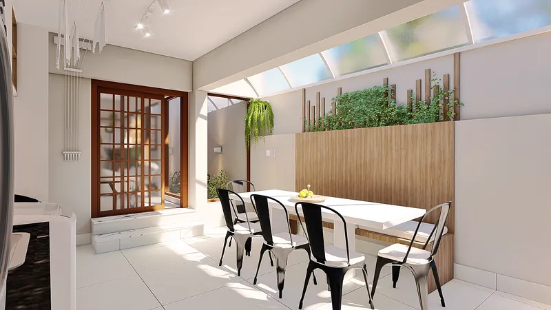 Residencial Astorga — Copa com mesa de vidro e cadeiras pretas junto ao jardim