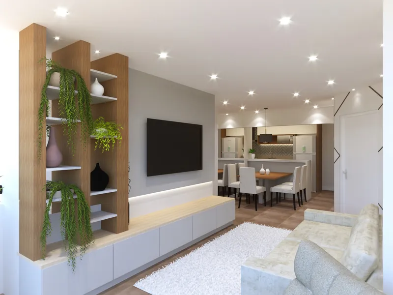 Residencial em Moema — Sala de estar com estante vazada e vegetação