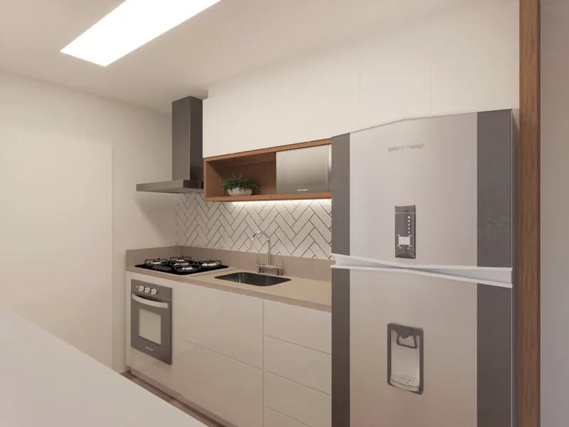 Residencial em Moema — Cozinha compacta com armários claros e cooktop