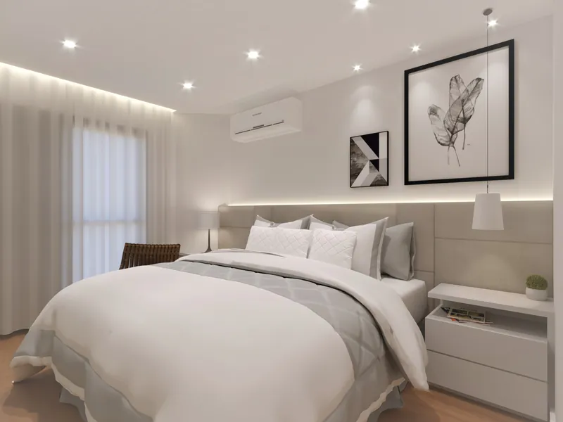 Residencial em Moema — Suíte máster com cama de casal e quadros