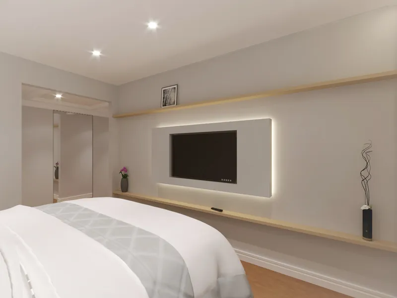 Residencial em Moema — Dormitório com painel de TV e iluminação embutida